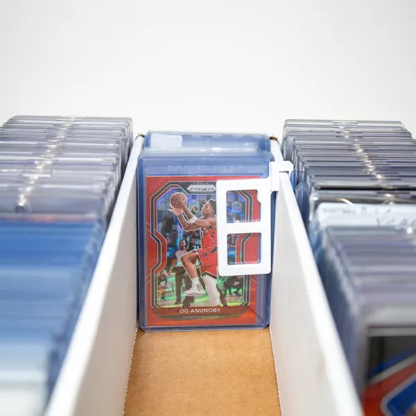 CardBlock card stopper keeping sports cards upright and organized in a storage box